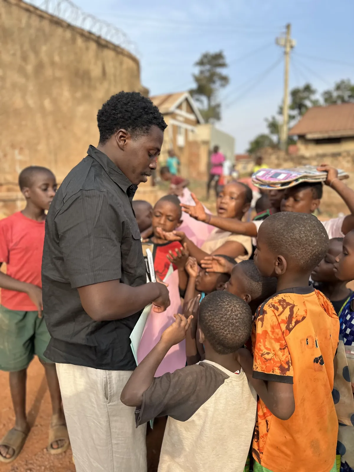 KSI mentor engaging with children in the community