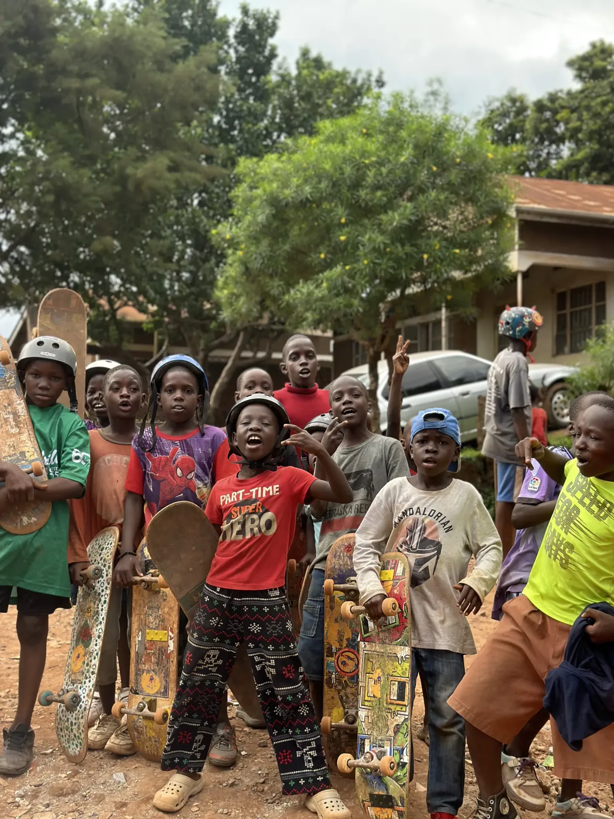 Group of KSI children and youth holding their skateboards